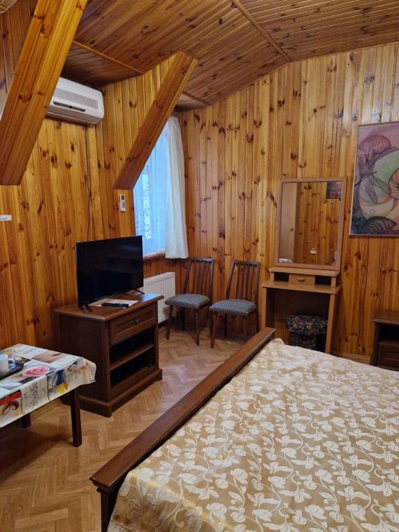 TV a/nebo společenská místnost v ubytování Nautilus