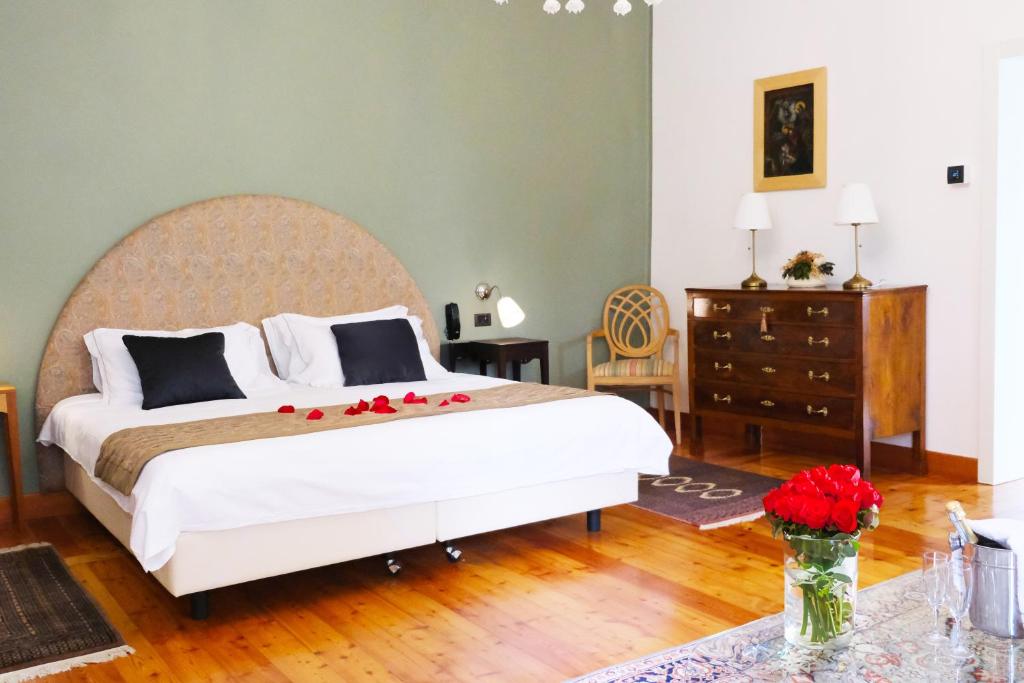 Postel nebo postele na pokoji v ubytování Hotel Villa Ca Damiani