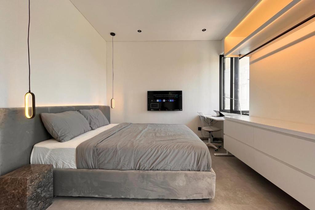 Ένα ή περισσότερα κρεβάτια σε δωμάτιο στο Modern Waveside Apartment No.3