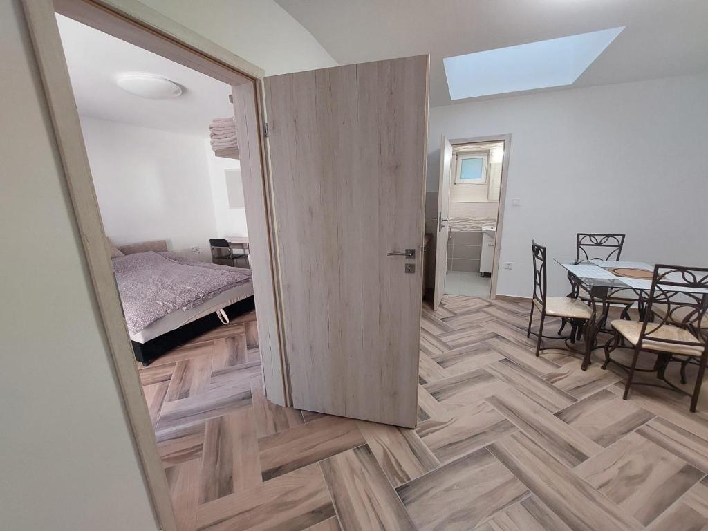 Posteľ alebo postele v izbe v ubytovaní Szépasszonyvölgy Apartman