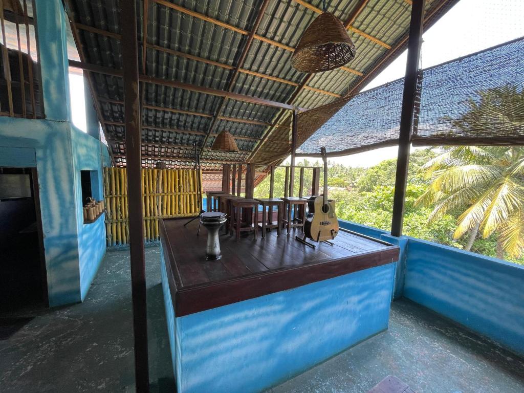 Balkón nebo terasa v ubytování Curly Hostel Negombo