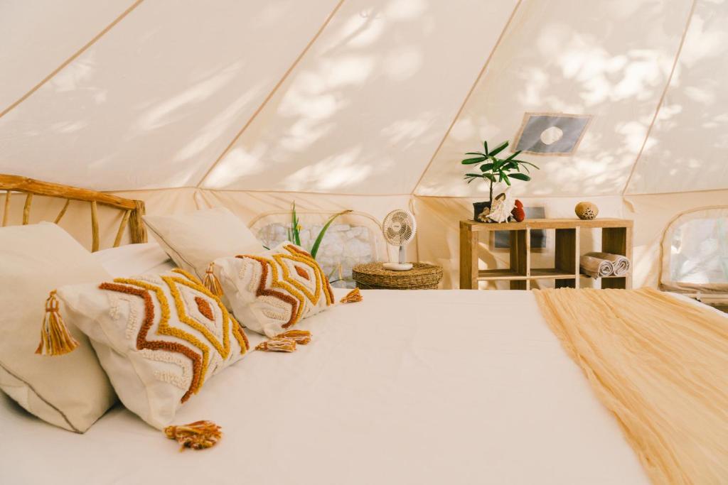 Postel nebo postele na pokoji v ubytování Parada Beach Camp