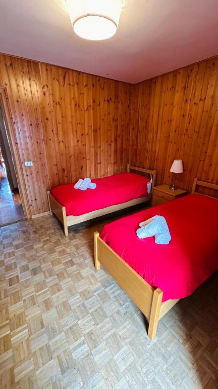 Postel nebo postele na pokoji v ubytování Appartamento Lagorai 1
