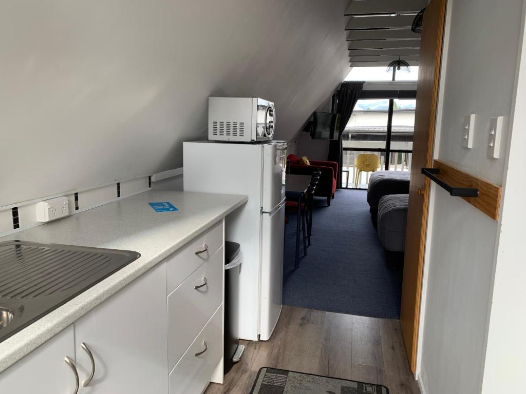 Kuchyň nebo kuchyňský kout v ubytování Wakatipu View Apartments