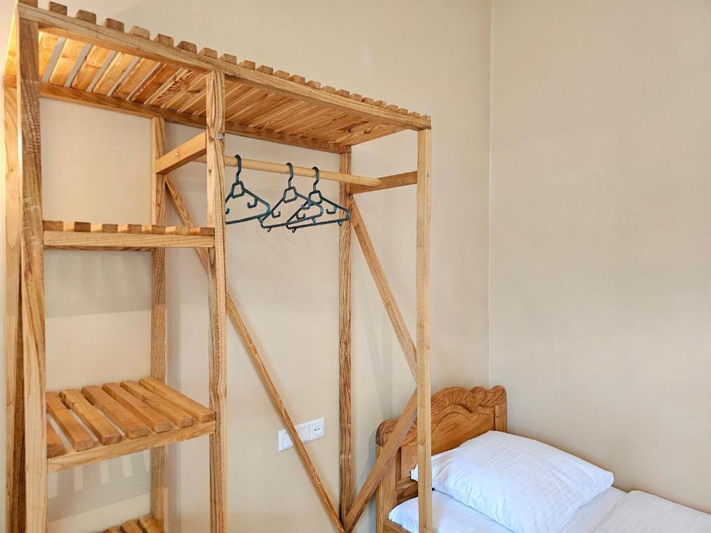 Postel nebo postele na pokoji v ubytování Hotel Magdalena