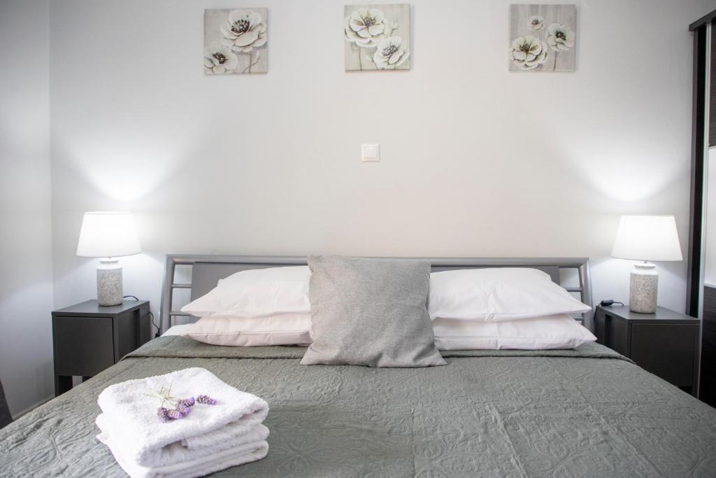 Postel nebo postele na pokoji v ubytování Anesis Apartments