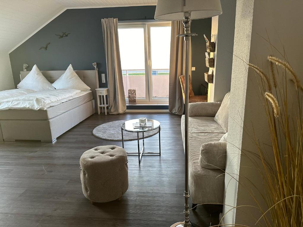 Postel nebo postele na pokoji v ubytování Hotel Restaurant Ostsee-Anker