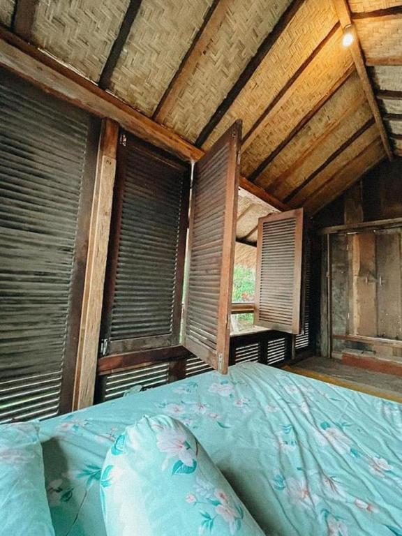 Postel nebo postele na pokoji v ubytování Pondok Apsari 2