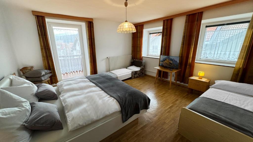 Postel nebo postele na pokoji v ubytování Residence Barbara