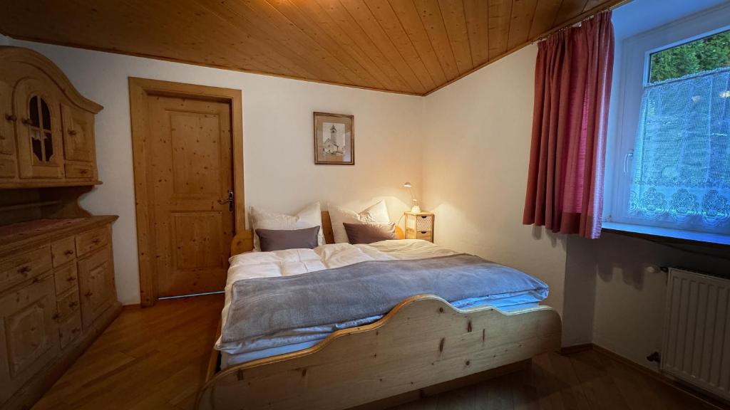 Postel nebo postele na pokoji v ubytování Residence Barbara