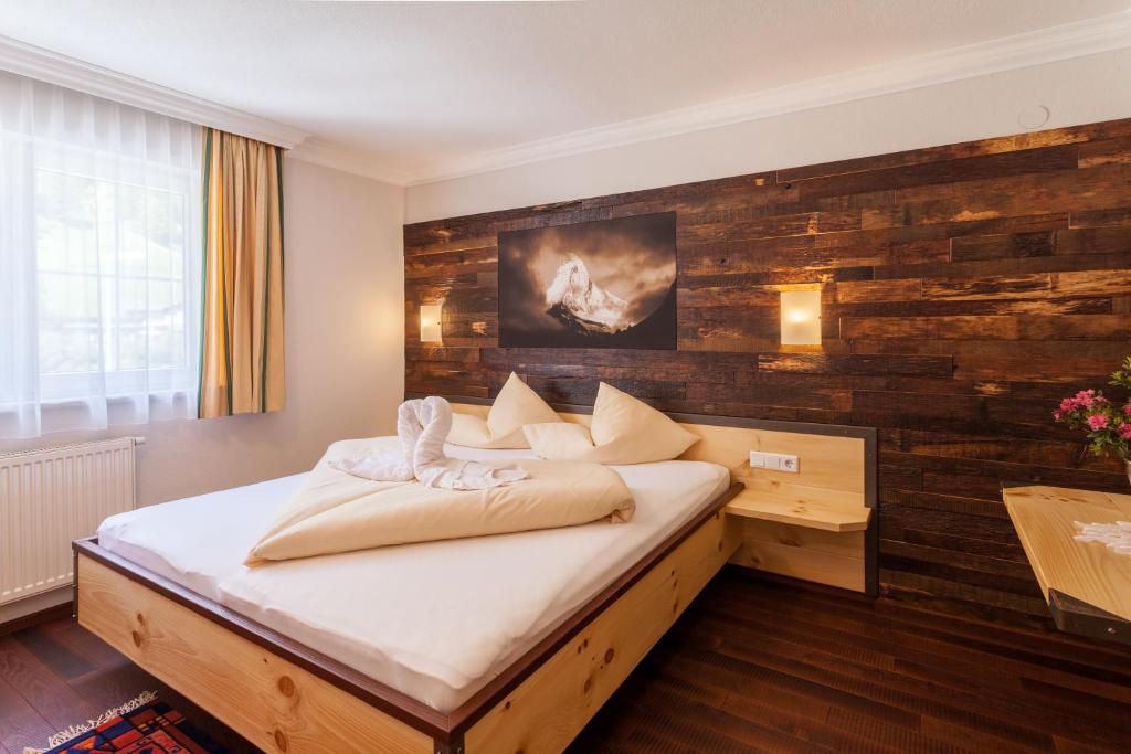 Posteľ alebo postele v izbe v ubytovaní Hotel Garni Ida