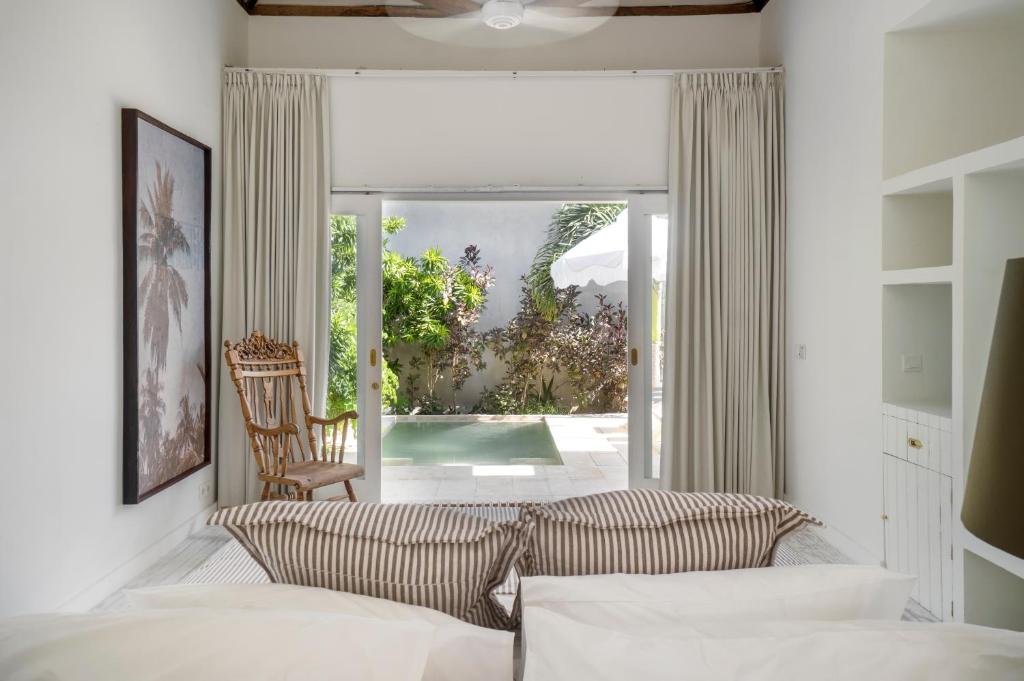 Ria Uluwatu, Tropical Chic Hotel