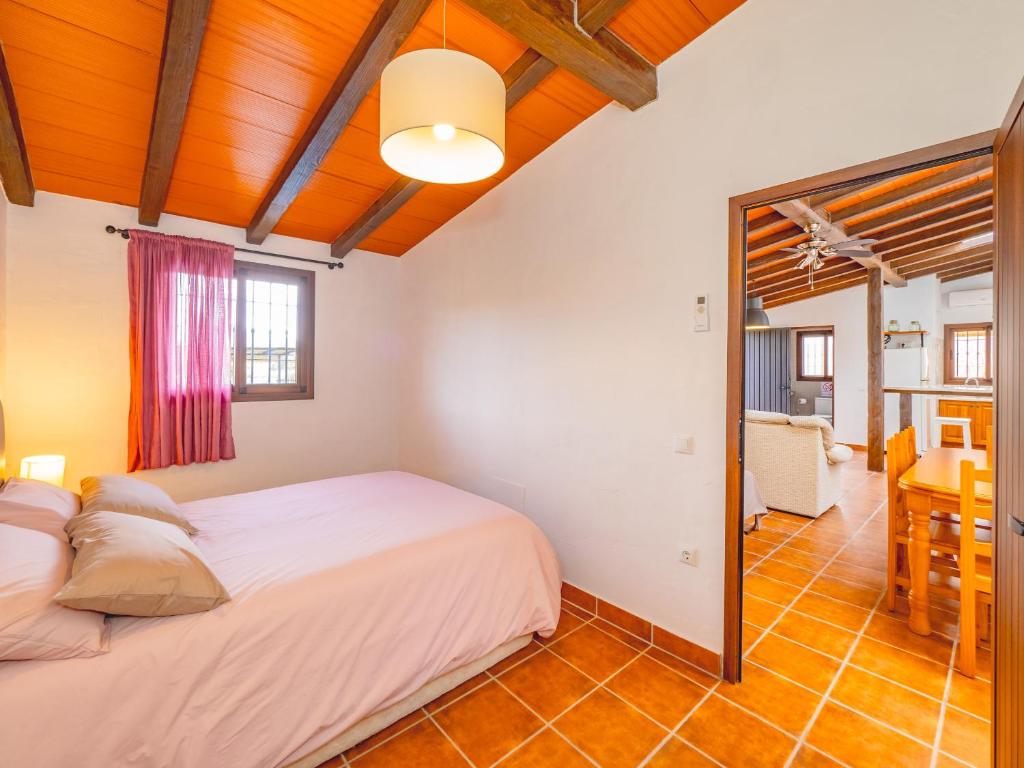 Postel nebo postele na pokoji v ubytování Cubo's Casita Rural Haro