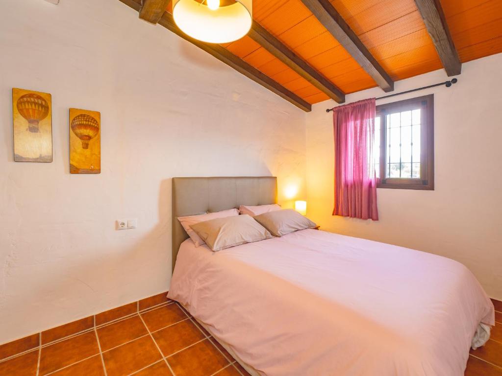Postel nebo postele na pokoji v ubytování Cubo's Casita Rural Haro