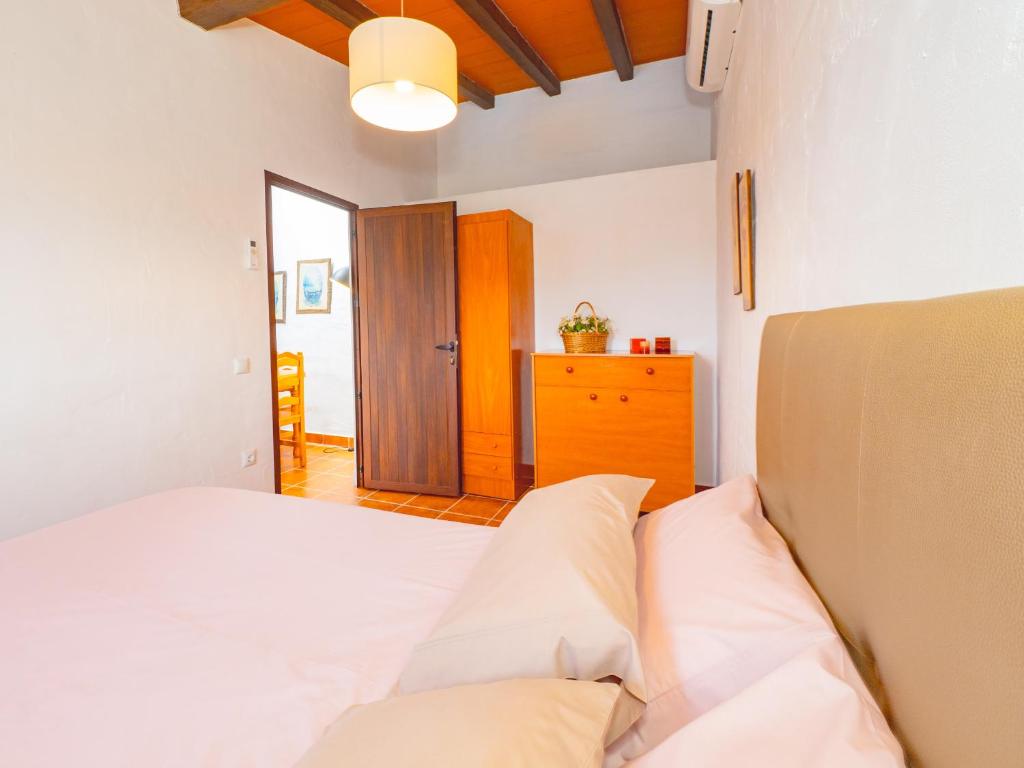 Postel nebo postele na pokoji v ubytování Cubo's Casita Rural Haro
