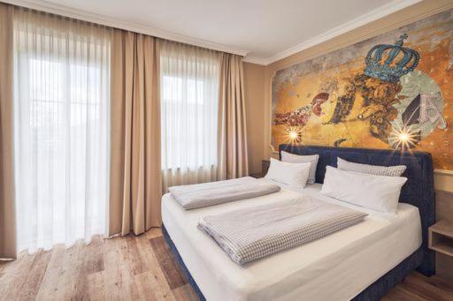 Postel nebo postele na pokoji v ubytování Hotel Starnberger See