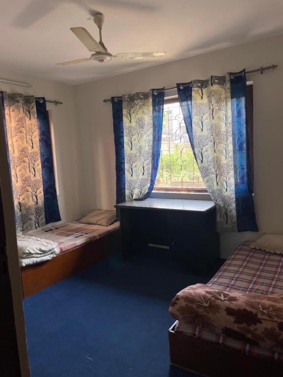 Postel nebo postele na pokoji v ubytování Kasaa Home