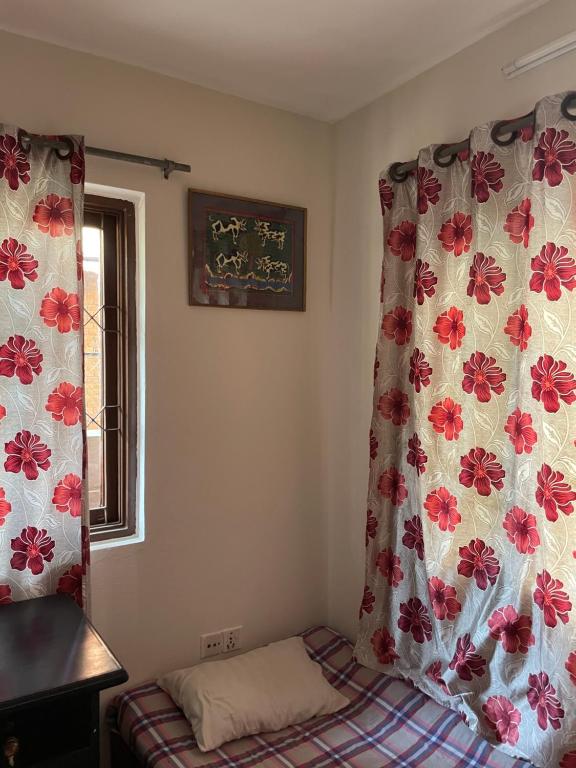 Postel nebo postele na pokoji v ubytování Kasaa Home