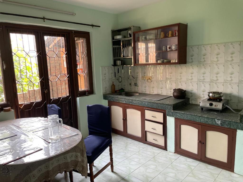 Kuchyň nebo kuchyňský kout v ubytování Kasaa Home