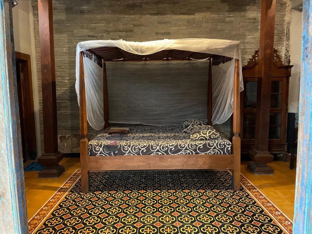 Postel nebo postele na pokoji v ubytování Bedhot Homestay