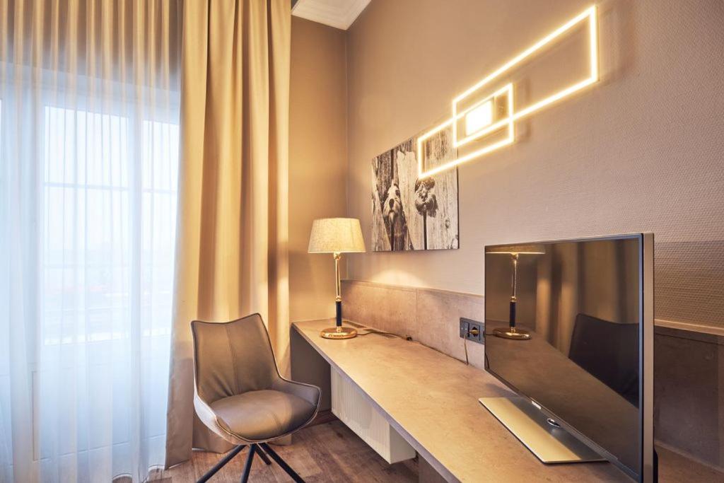 TV a/nebo společenská místnost v ubytování Hotel Starnberger See
