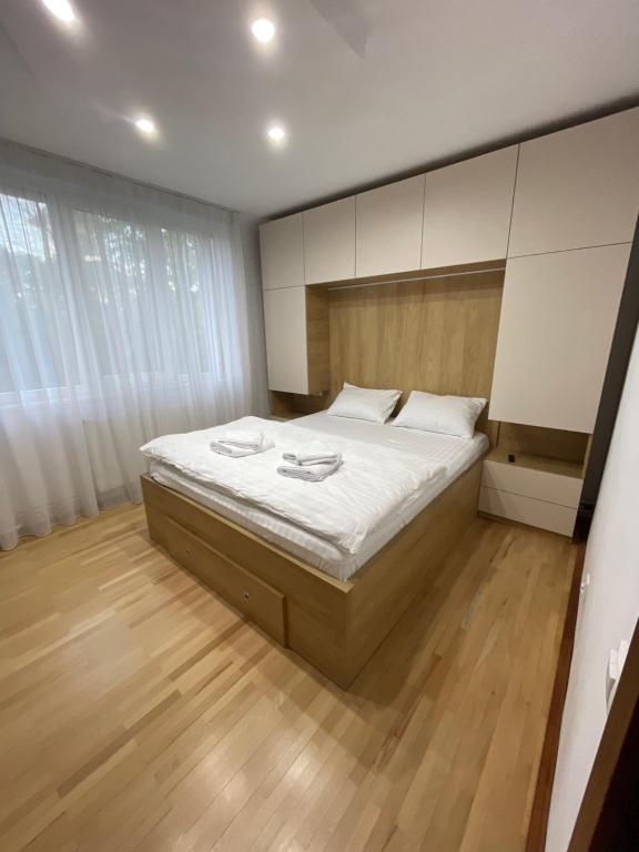 Katil atau katil-katil dalam bilik di Central Cozy Apartament Near Monastery