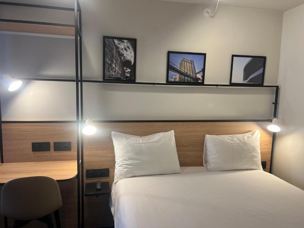 Postel nebo postele na pokoji v ubytování ibis Lorient Centre Gare