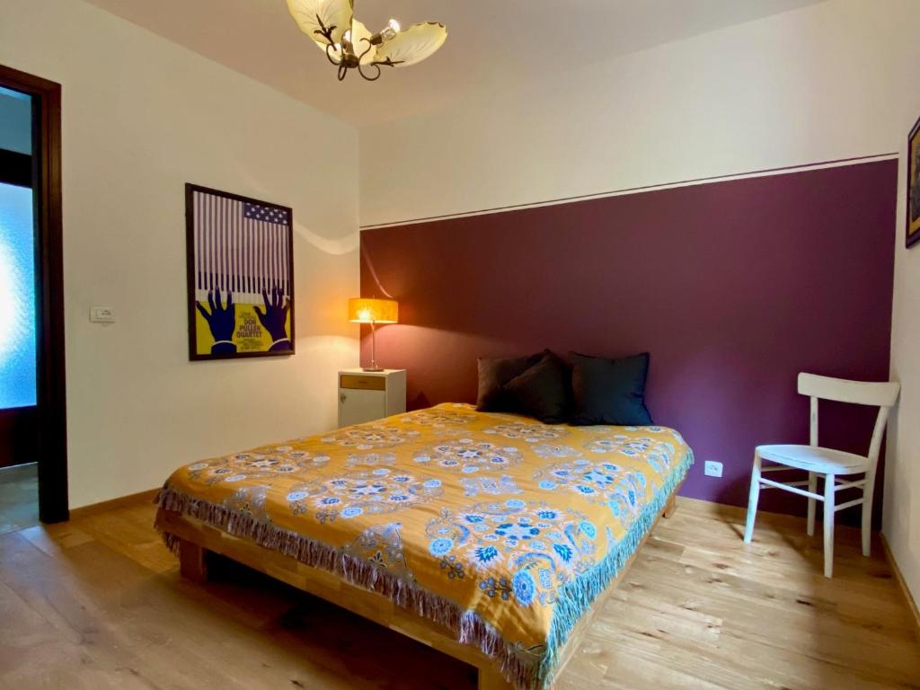 Postel nebo postele na pokoji v ubytování Villa Rosa Friuli