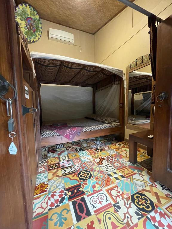 Postel nebo postele na pokoji v ubytování Bedhot Homestay