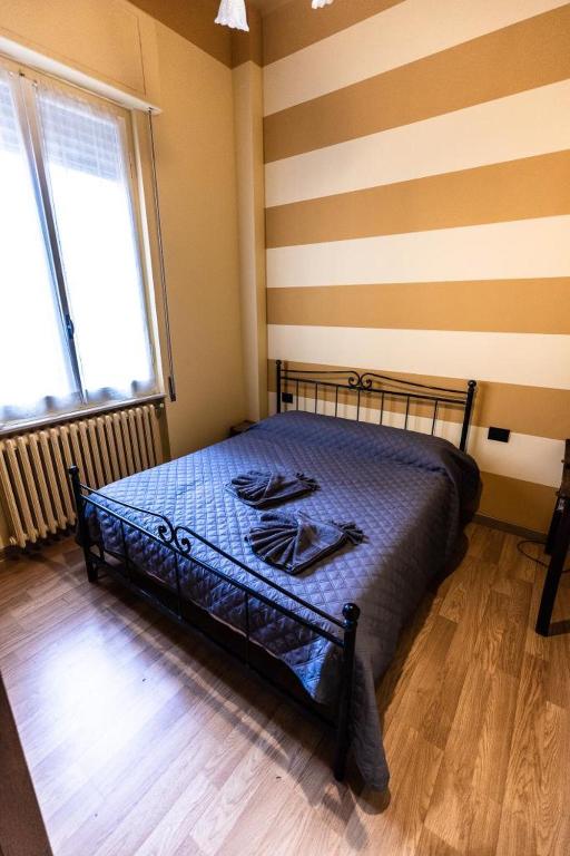 Postel nebo postele na pokoji v ubytování IL VENTIDUE