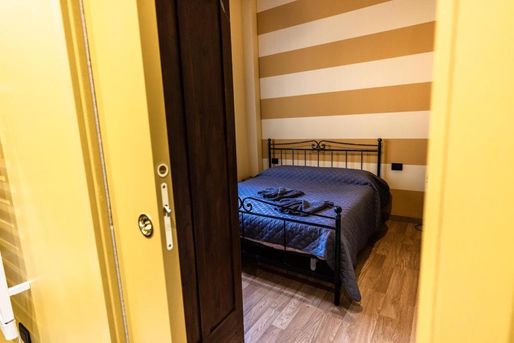 Postel nebo postele na pokoji v ubytování IL VENTIDUE