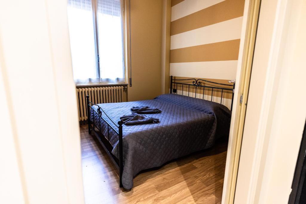 Postel nebo postele na pokoji v ubytování IL VENTIDUE