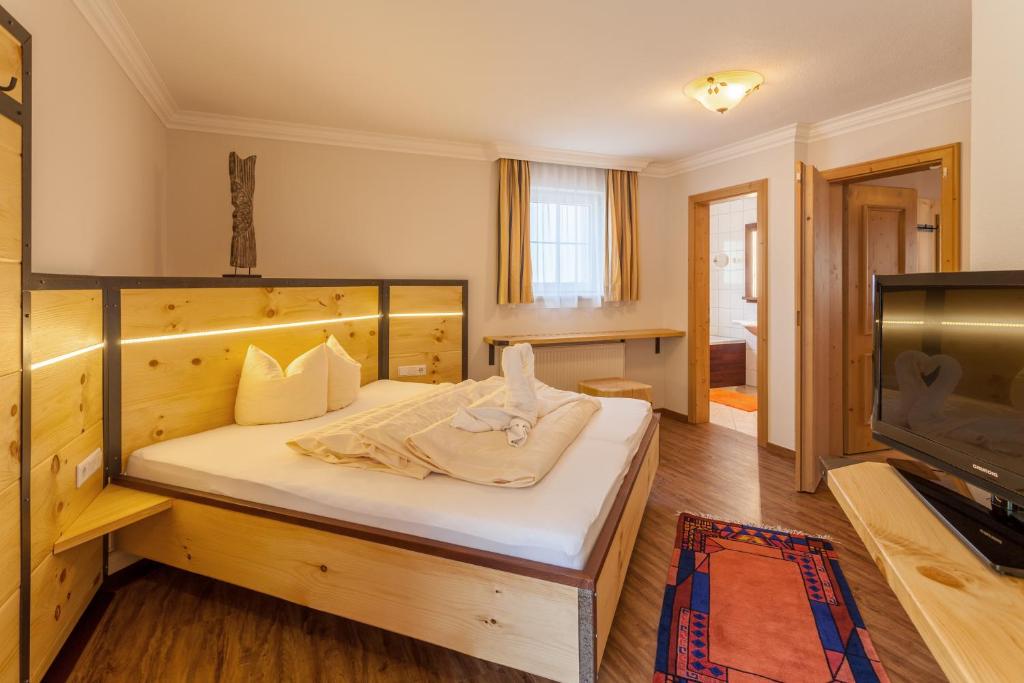 Posteľ alebo postele v izbe v ubytovaní Hotel Garni Ida