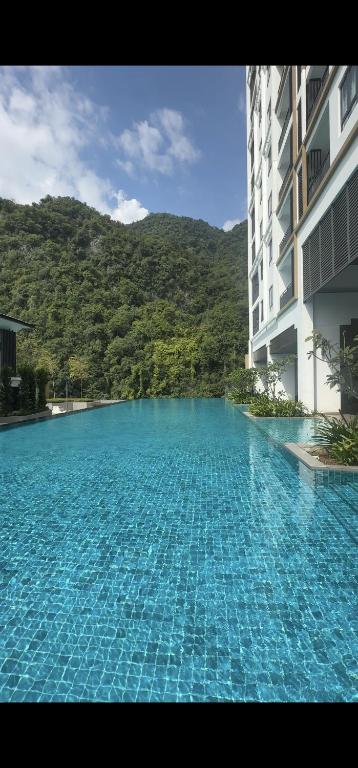 Bazén v ubytování Doma House Onsen at Sunway Onsen, Tambun nebo v jeho okolí