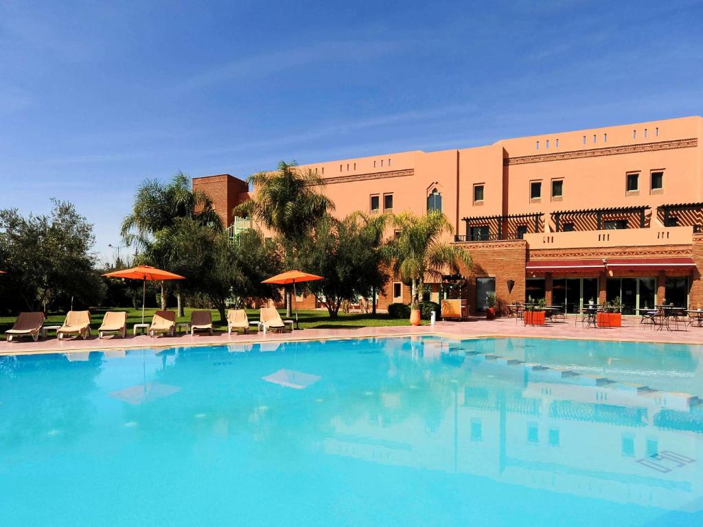 Bazén v ubytování Ibis Marrakech Palmeraie nebo v jeho okolí