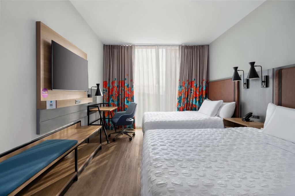 Postel nebo postele na pokoji v ubytování Tru By Hilton Brooklyn