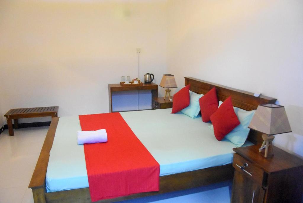 Postel nebo postele na pokoji v ubytování Cozy Homestay Kandy