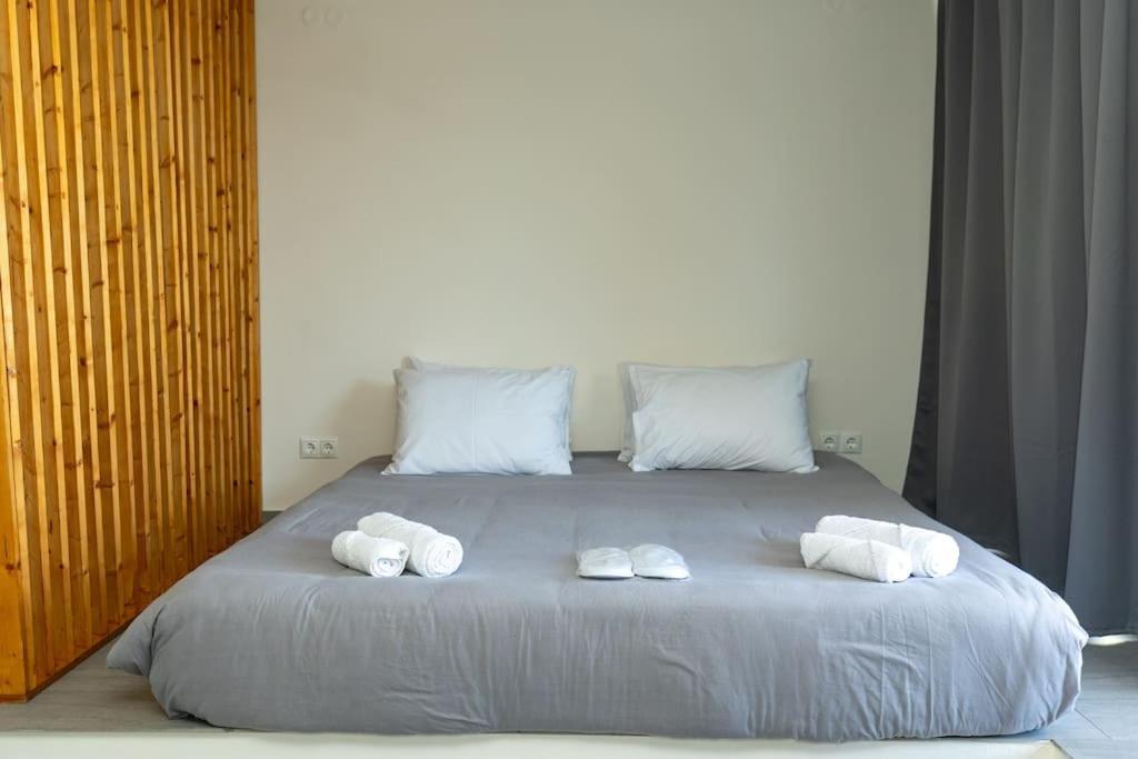 Postel nebo postele na pokoji v ubytování DeKo Penthouse Suite
