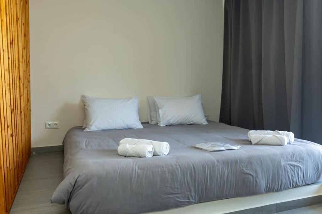 Postel nebo postele na pokoji v ubytování DeKo Penthouse Suite