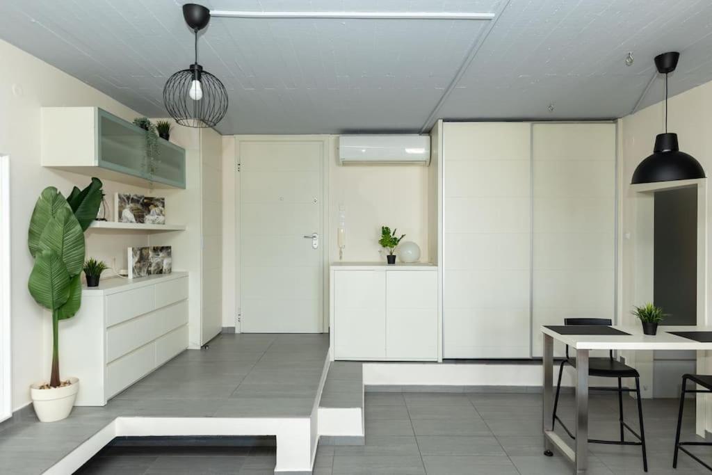 Kuchyň nebo kuchyňský kout v ubytování DeKo Penthouse Suite