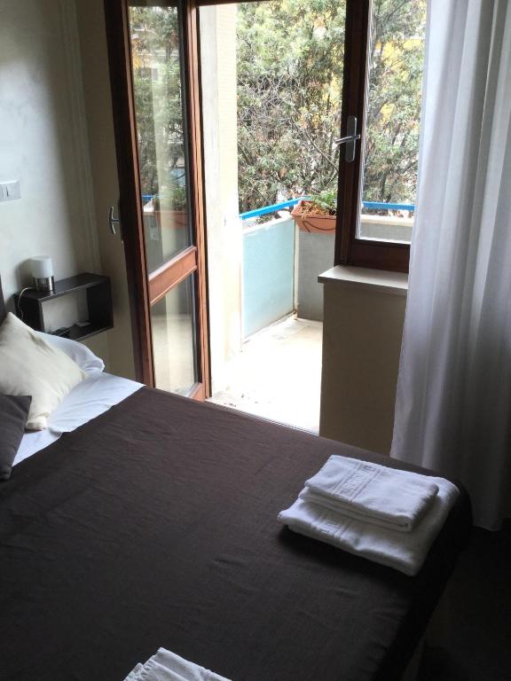 Postel nebo postele na pokoji v ubytování Domus Corso Umberto 18 B&B