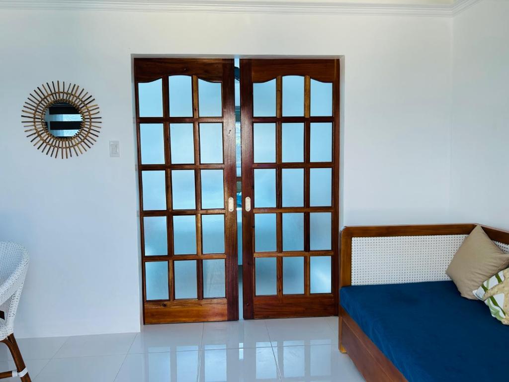 Postel nebo postele na pokoji v ubytování 1888 Beach Resort