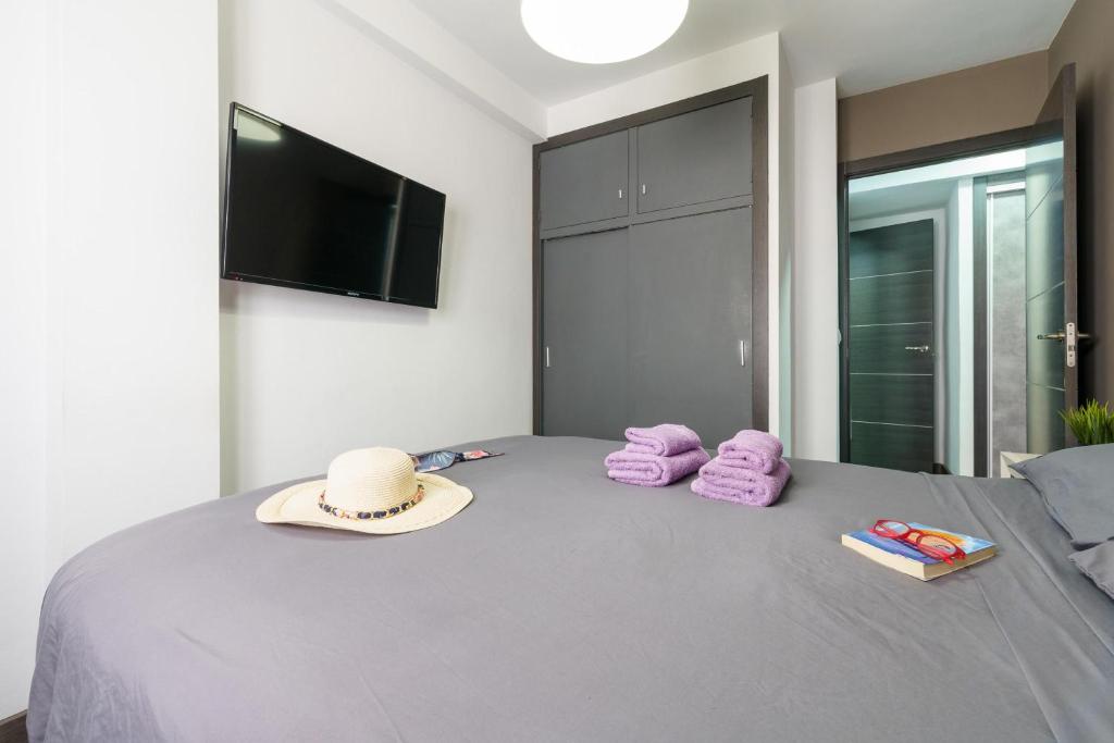 Televízia a/alebo spoločenská miestnosť v ubytovaní Nerja City Center Apartment - Happy Rentals