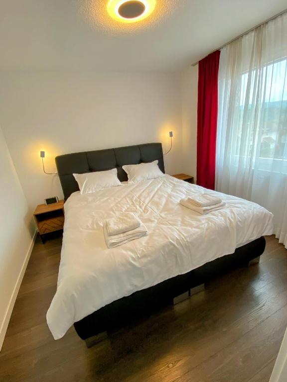Postel nebo postele na pokoji v ubytování Cozy Escape House - 12 min to Zurich HB - Free Parking