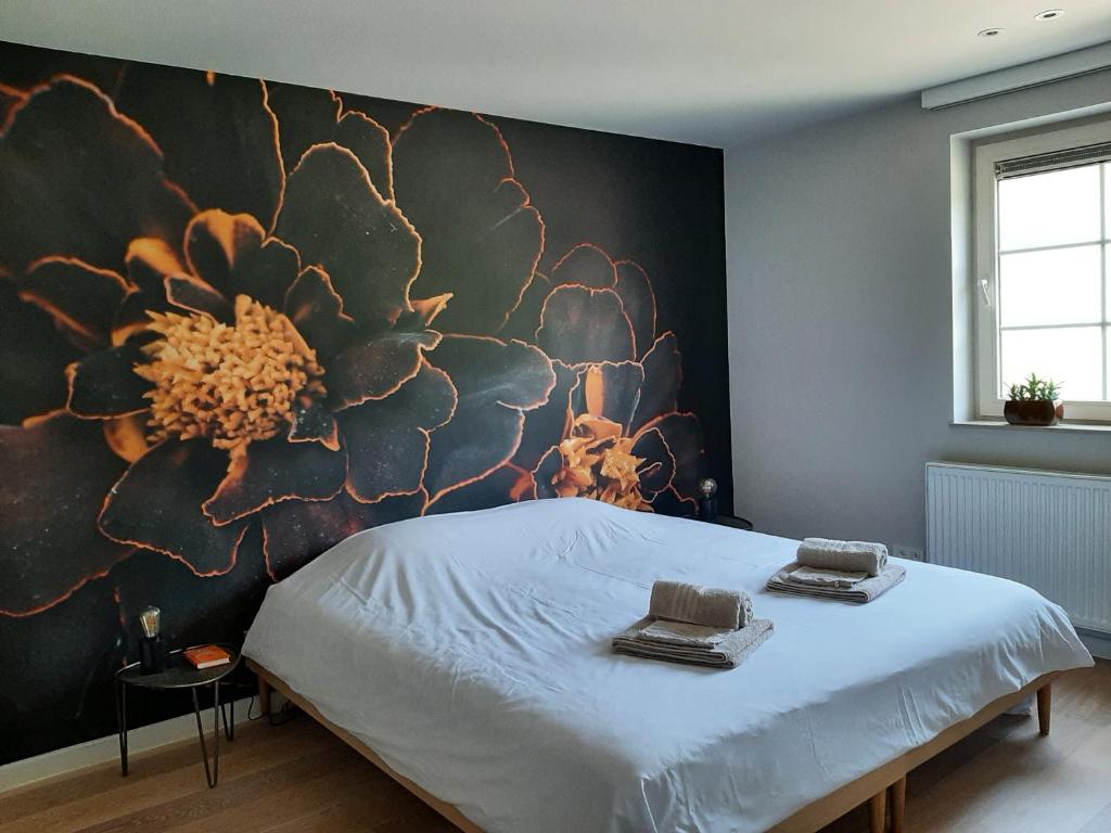 Postel nebo postele na pokoji v ubytování B&B De Levensboom