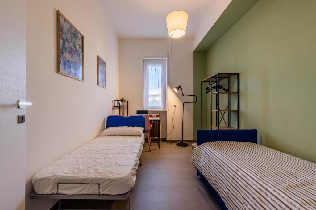 Postel nebo postele na pokoji v ubytování Chez Monique
