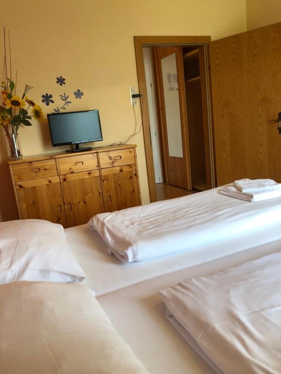 Postel nebo postele na pokoji v ubytování Hotel Ötscherblick