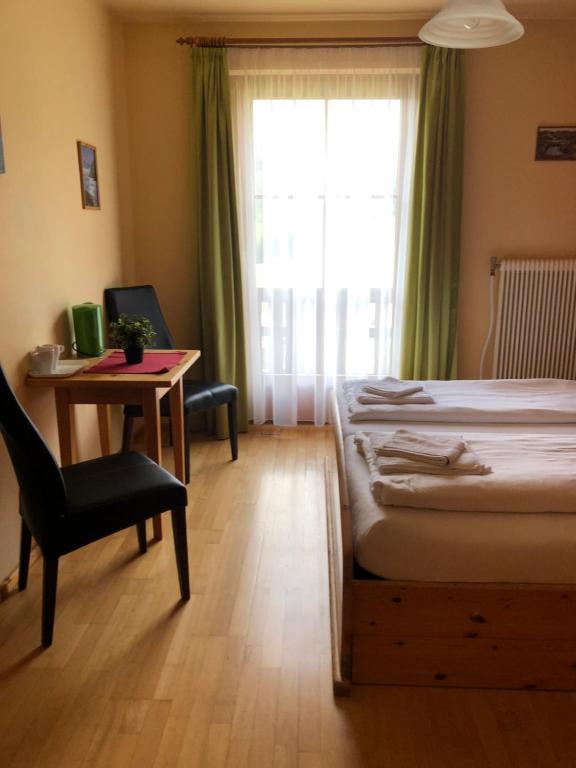 Postel nebo postele na pokoji v ubytování Hotel Ötscherblick