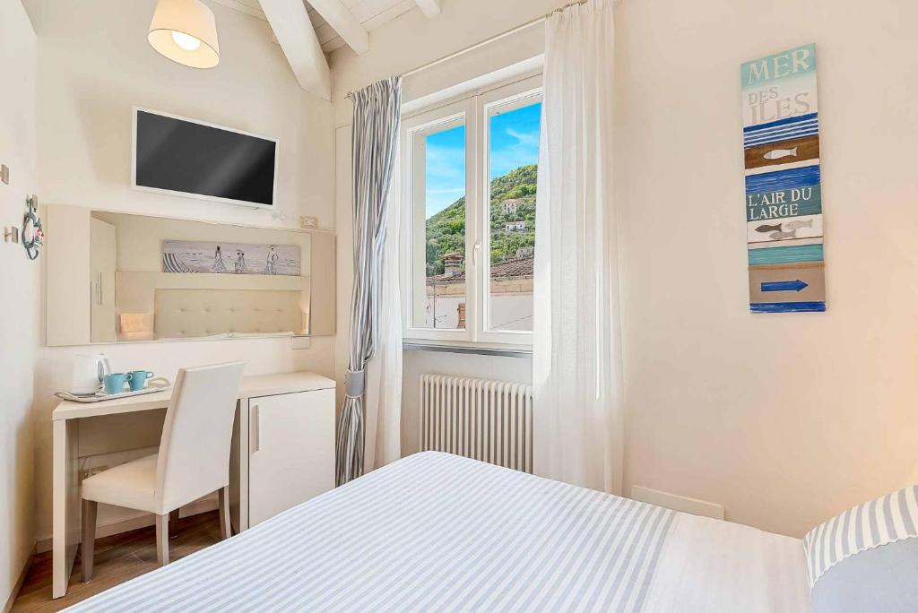 Postel nebo postele na pokoji v ubytování Dreams Guest House