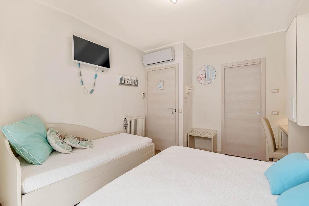 Postel nebo postele na pokoji v ubytování Dreams Guest House